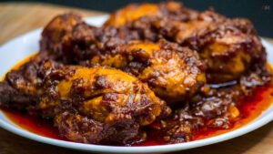 Chicken kala bhuna recipe in bengali