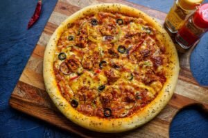 Chicken Pizza Recipe in Oven Bengali Atanur Rannaghar